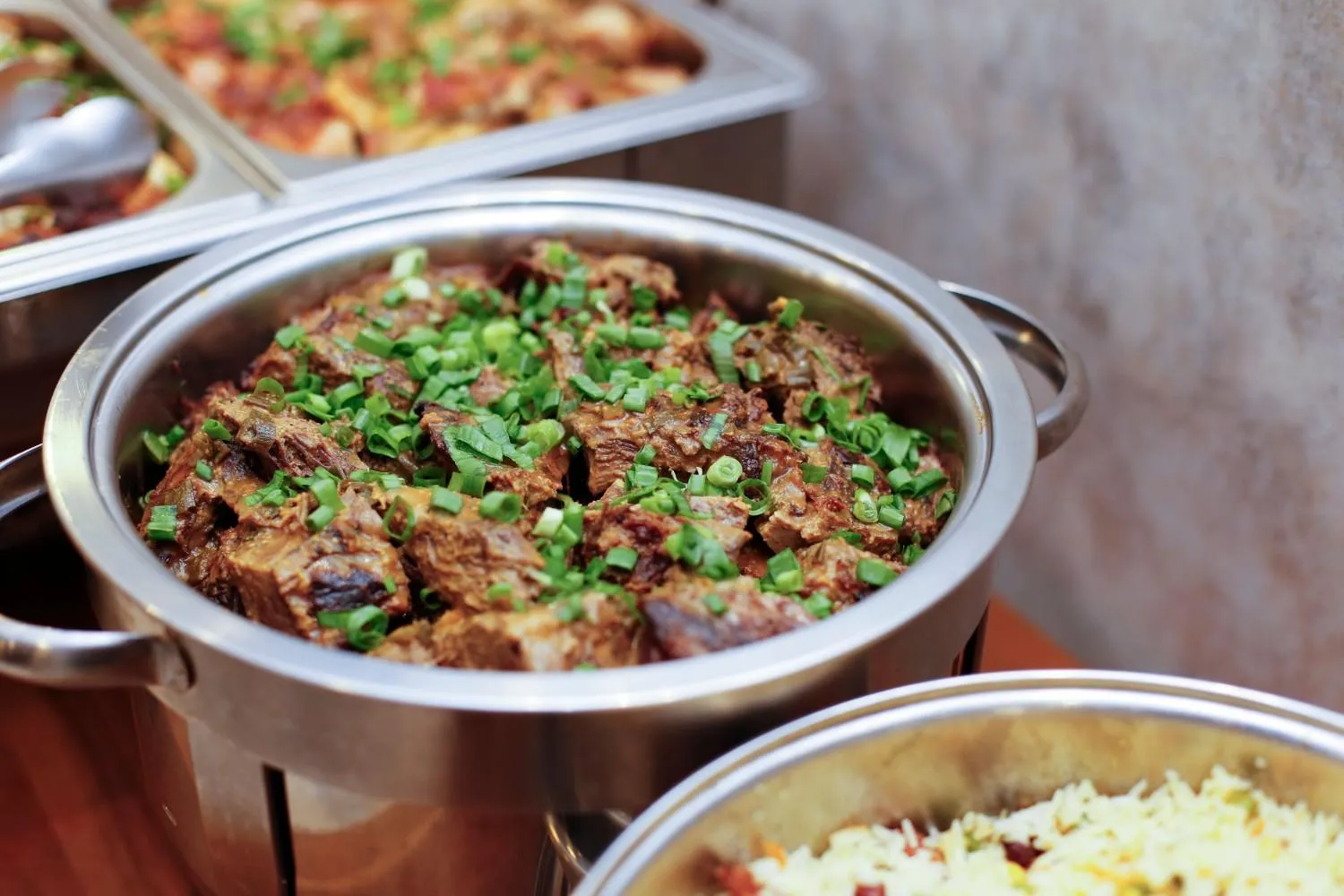 delicious dishes in stainless steel chafing dishes.