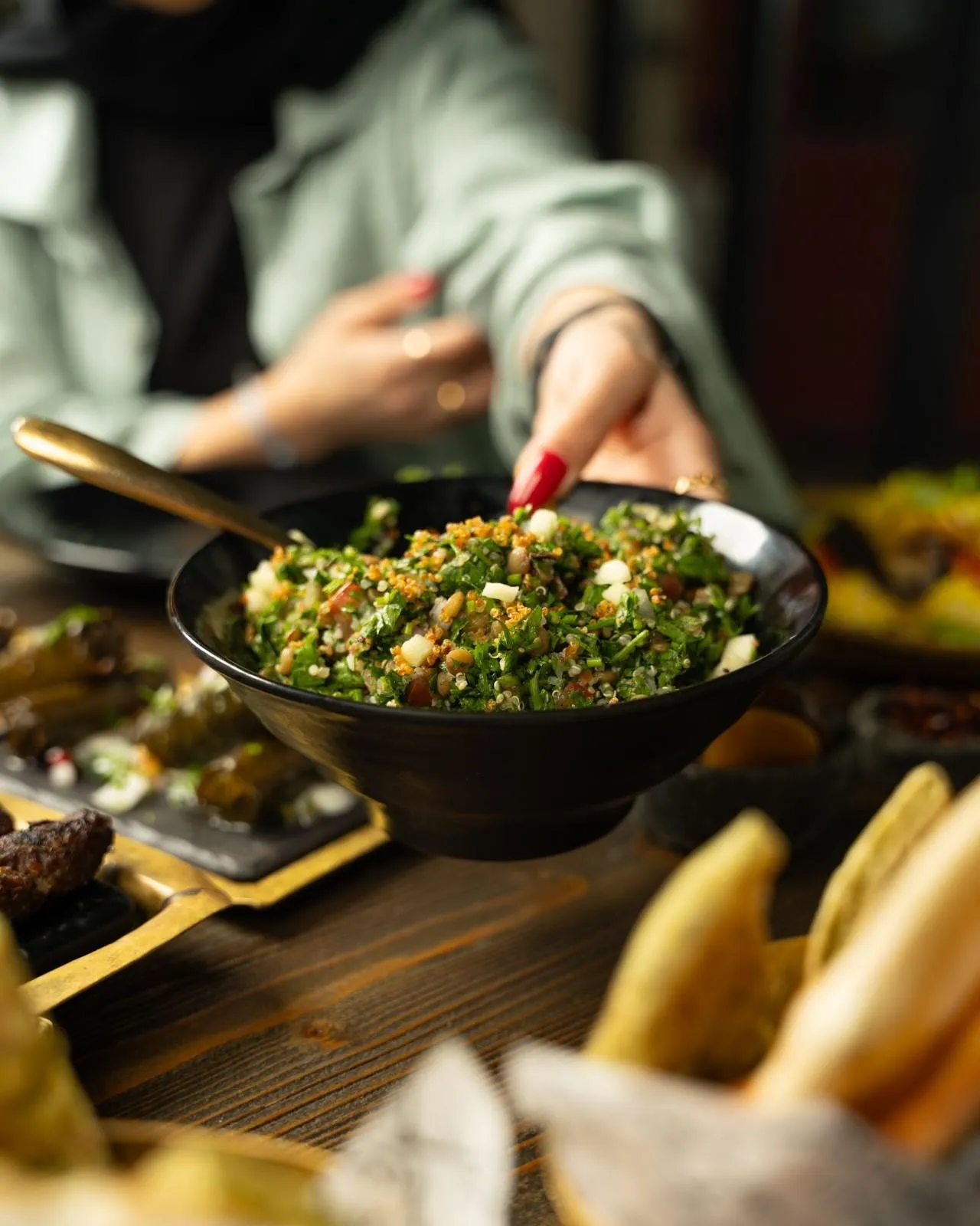 Vibrant tabbouleh salad with fresh ingredients, in fine dining Mediterranean restaurant 